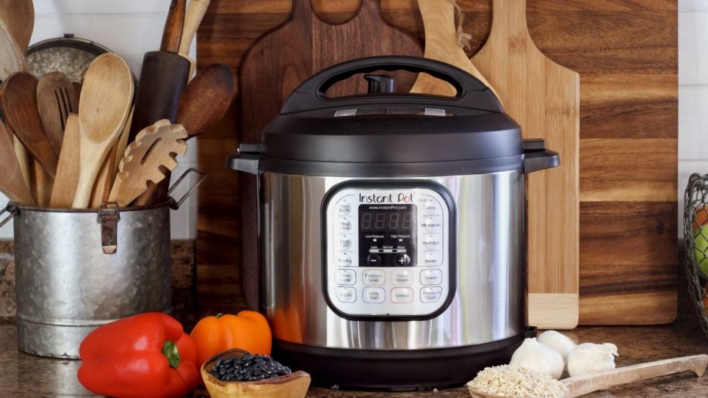 photo of an instant pot surrounded by cooking ingredients
