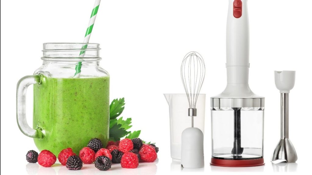 image of a green smoothie and berries next to immersion blender parts