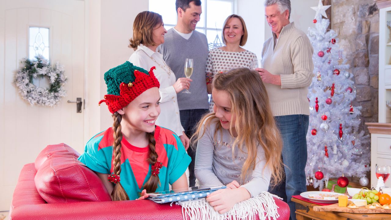 a family spending time together, figuring out ways to celebrate the 12 days of christmas