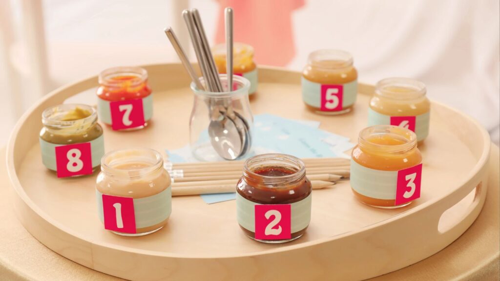 numbered jars of baby food on a tray